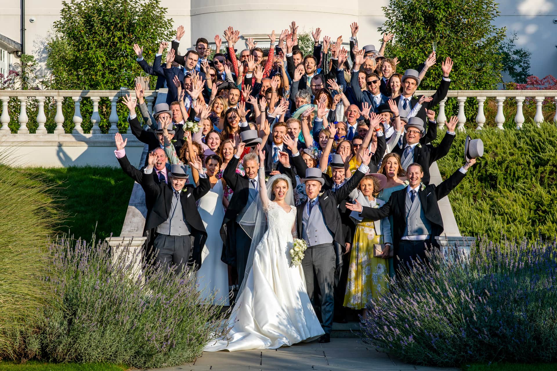 big group shot of everyone at a wedding