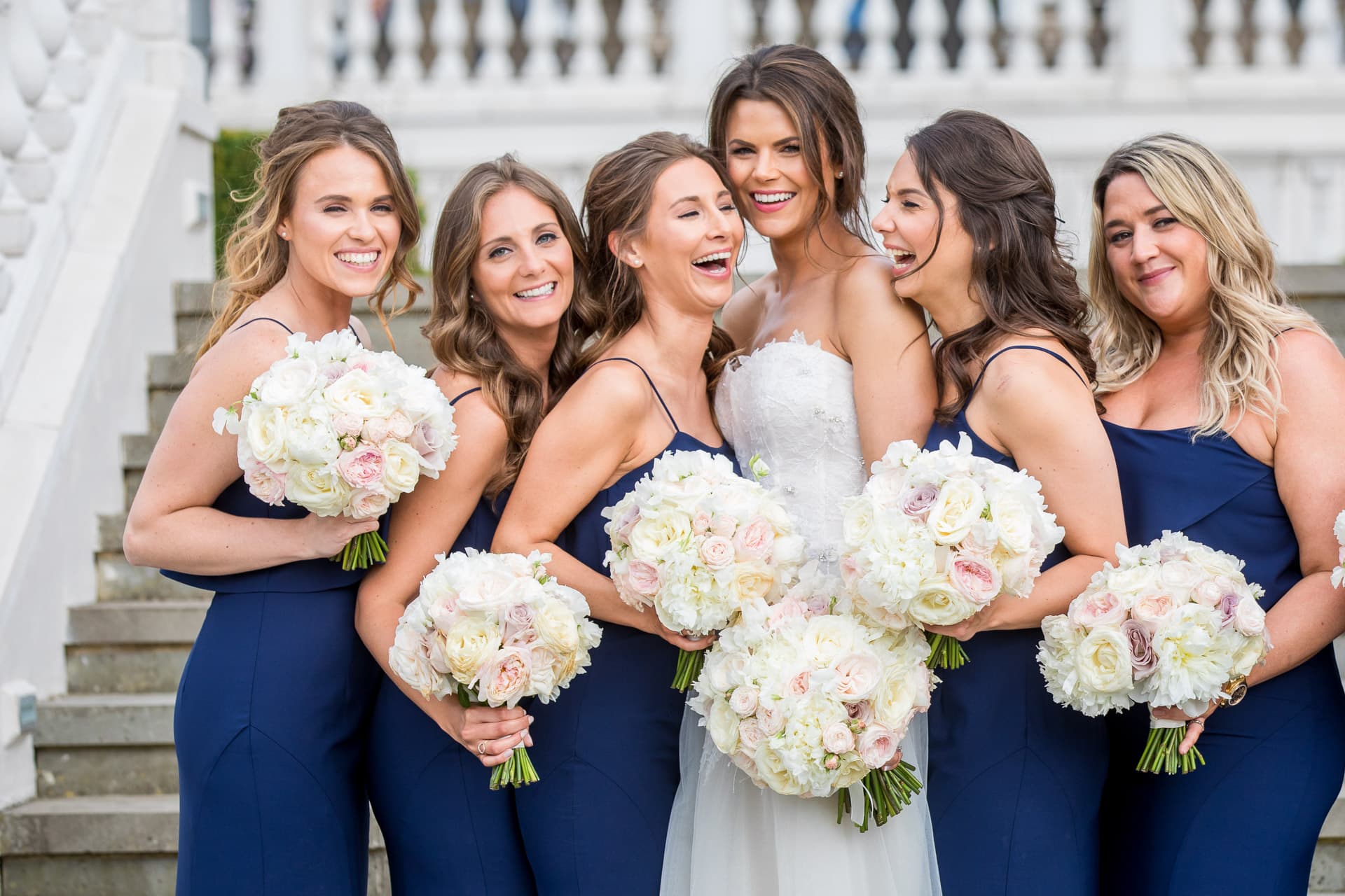 bridal party wearing navy dresses