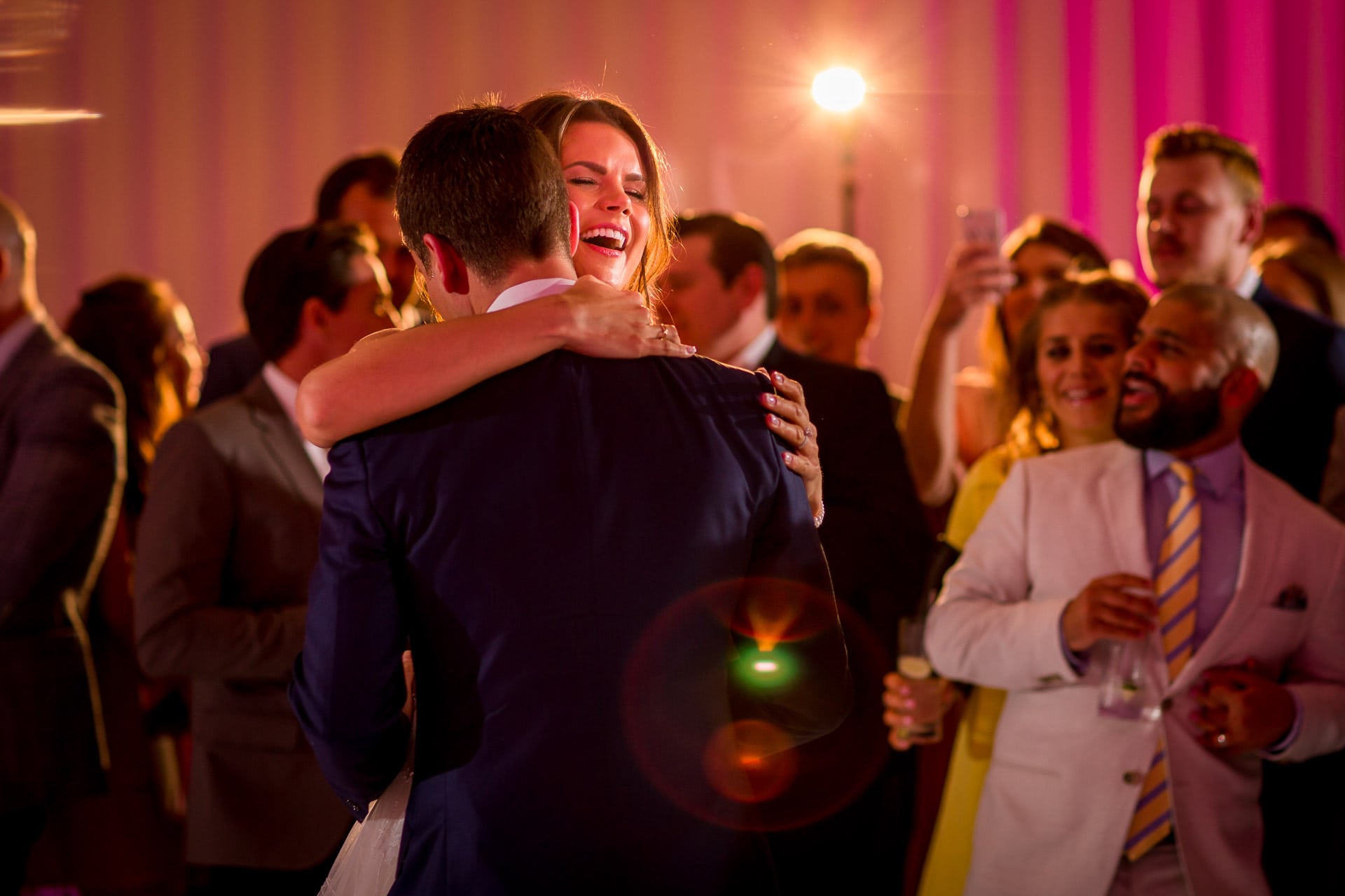 first dance moment between happy couple