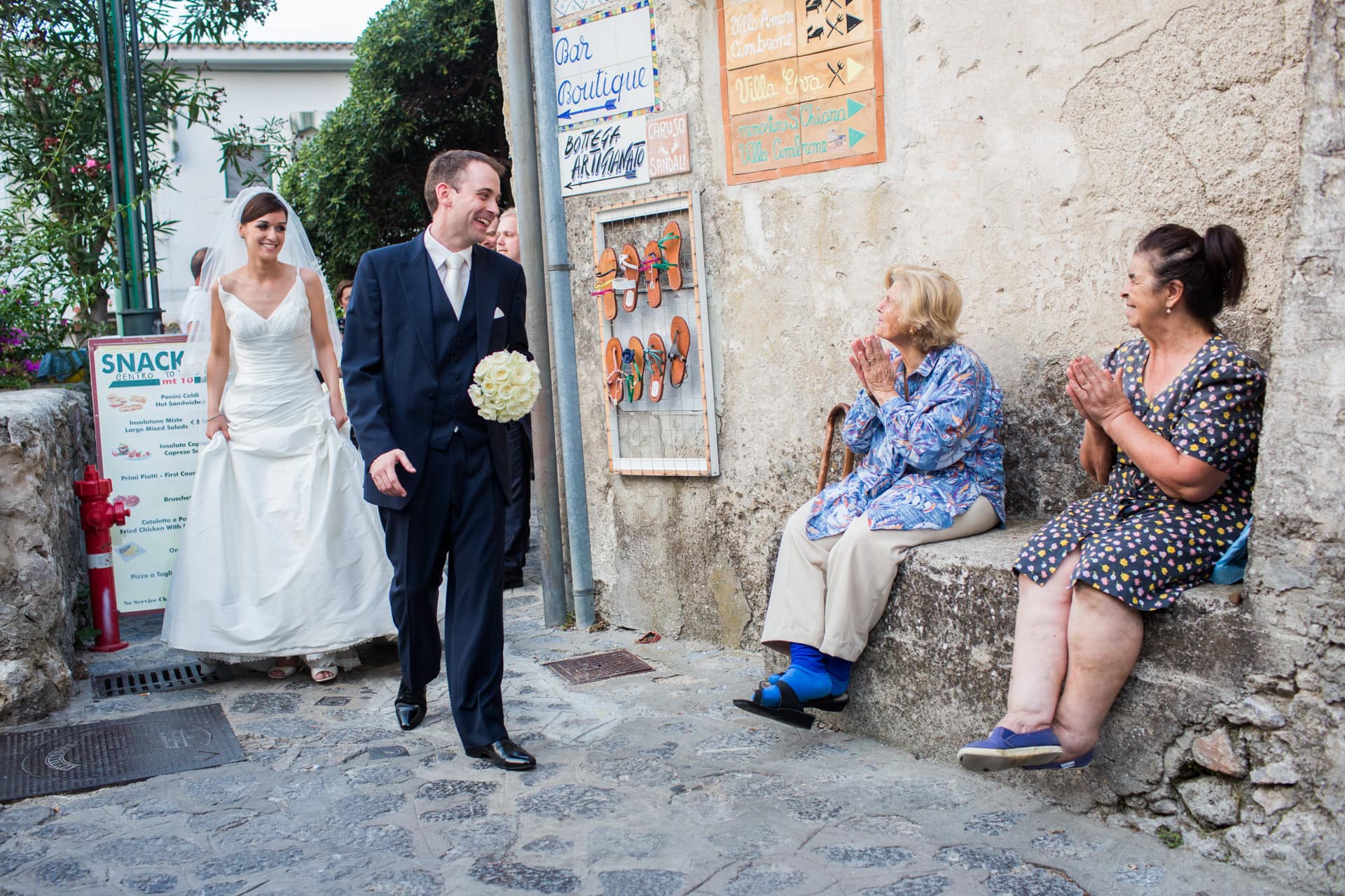 couple being clapped by Ravello locals