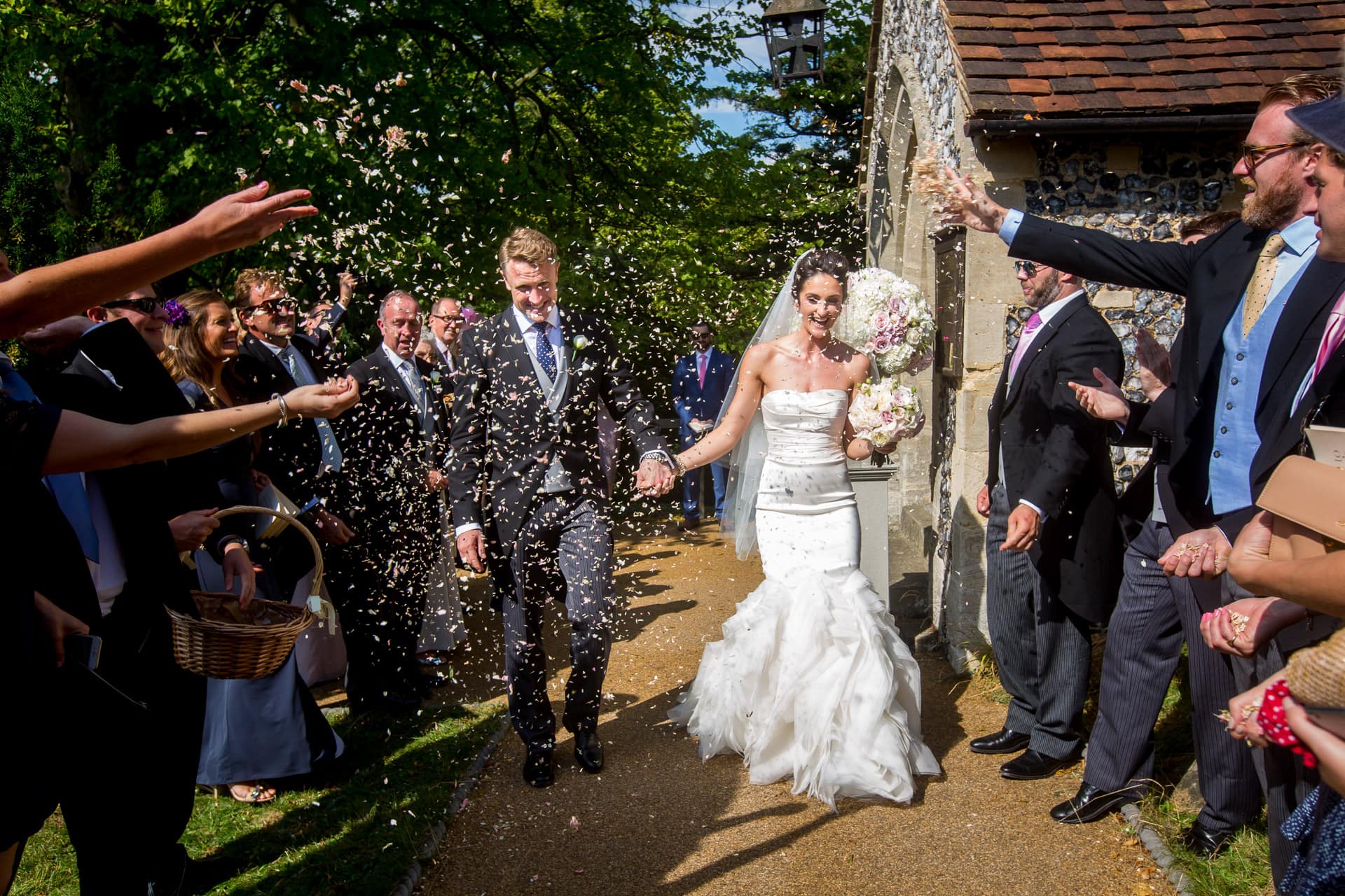 bride and groom exit to confetti