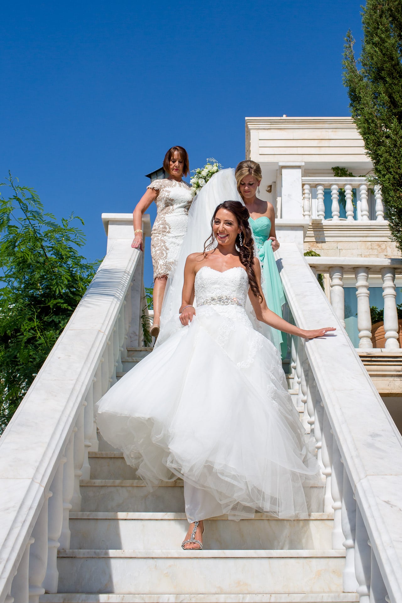 bride walking down staircase