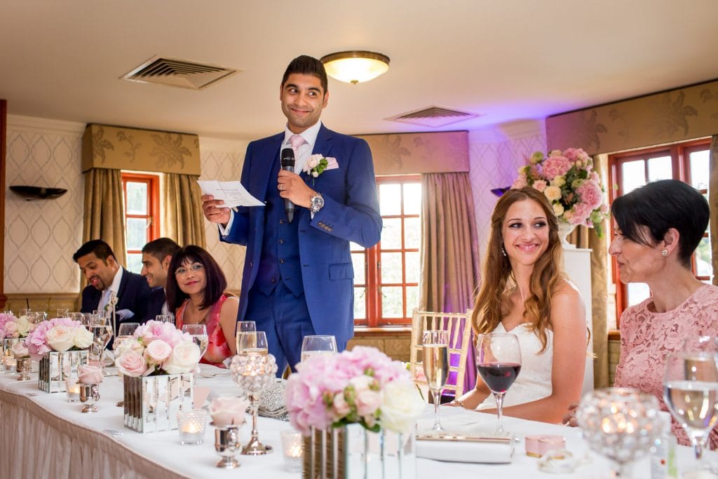 groom giving his speech from the top table