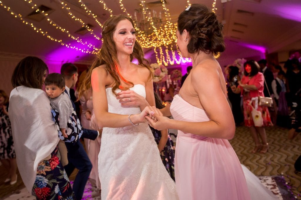 bride dancing with her chief bridesmaid