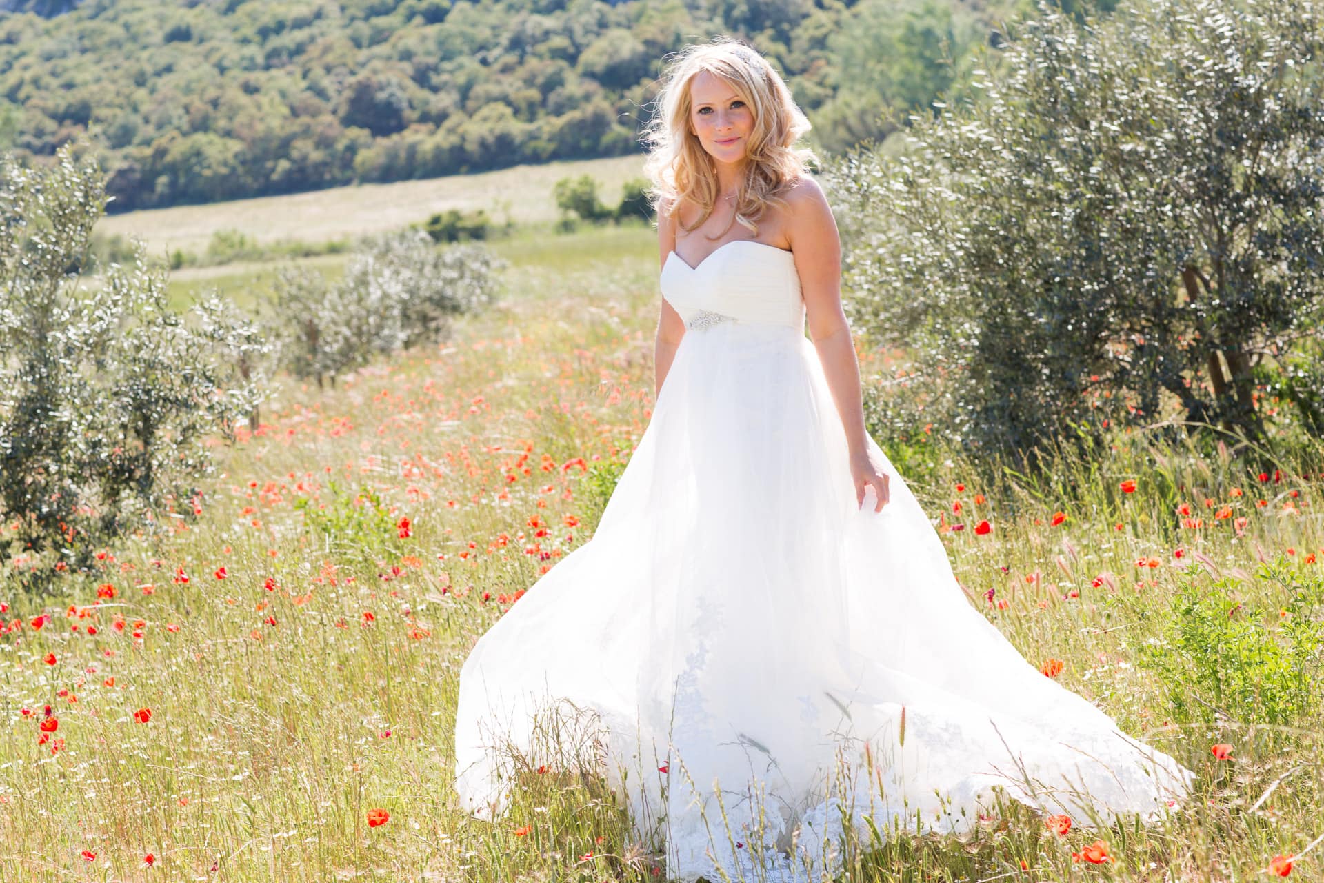 Bride in poppy fields in France
