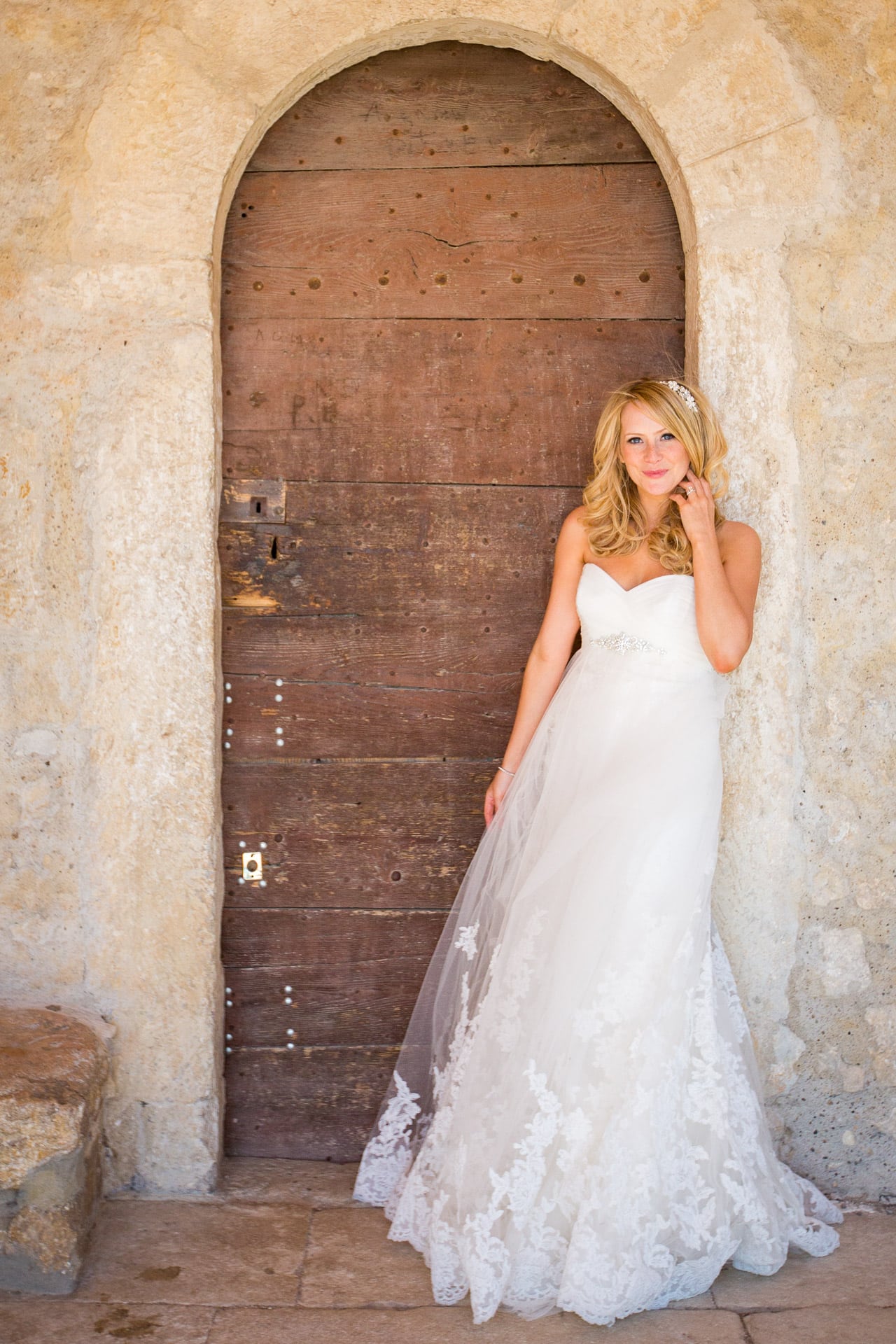 pretty bride in a chateau doorway