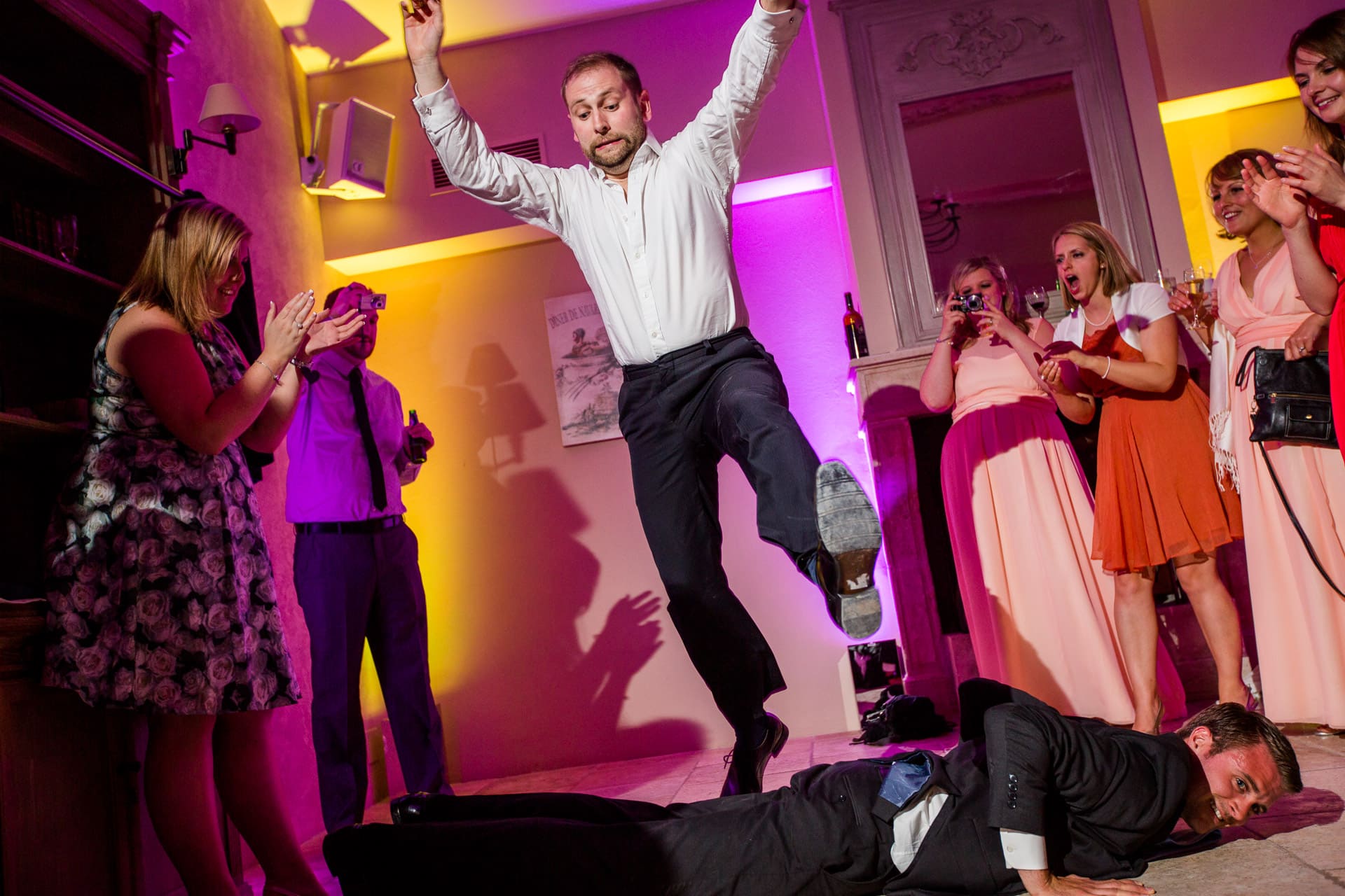 jumping over the best man