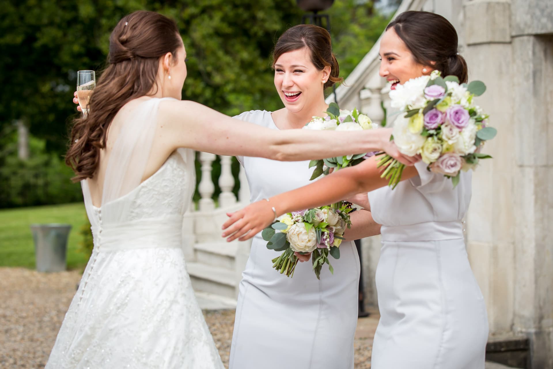 bridesmaids hugging