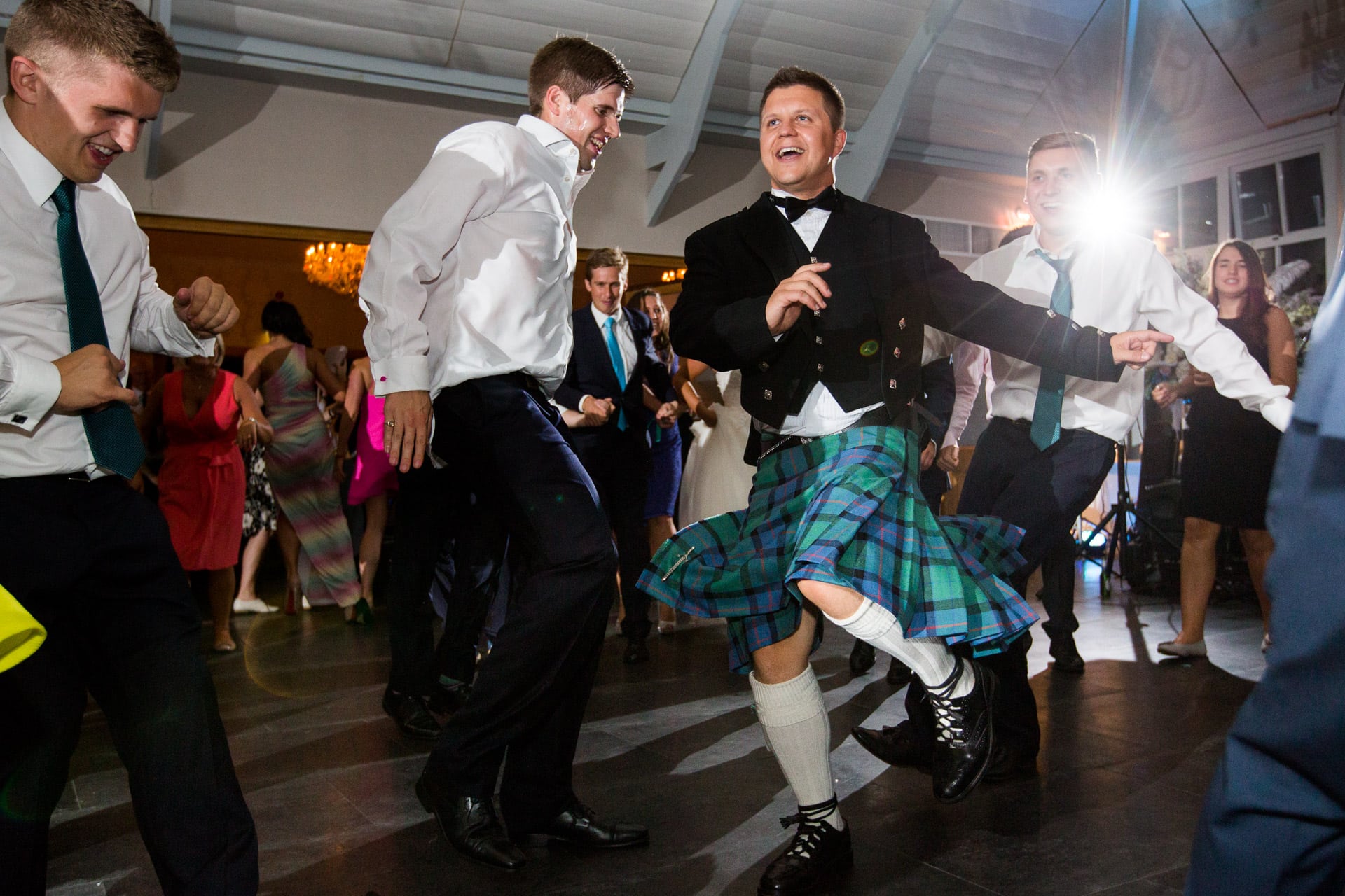 groom dancing in kilt