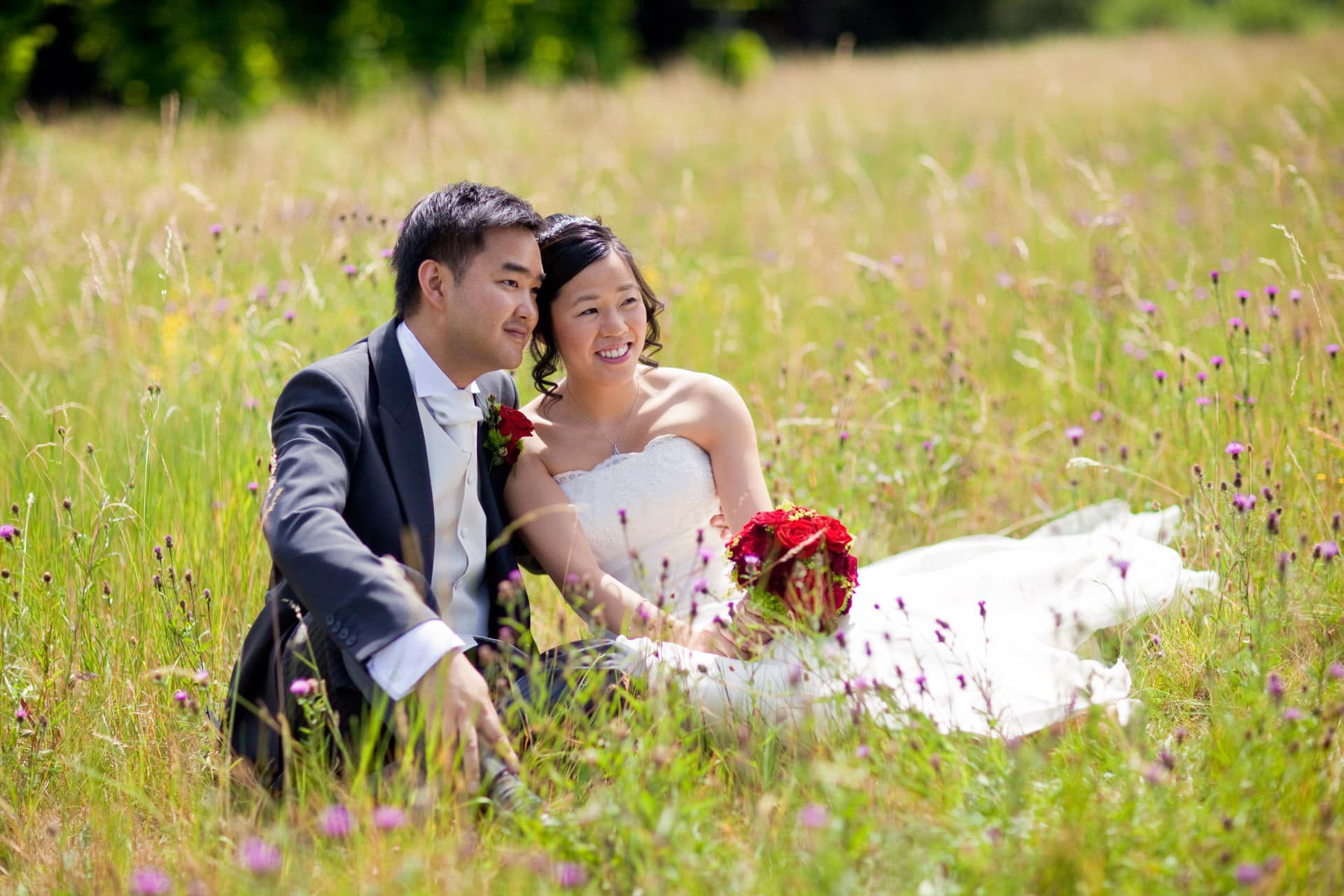 bride and groom in long grass
