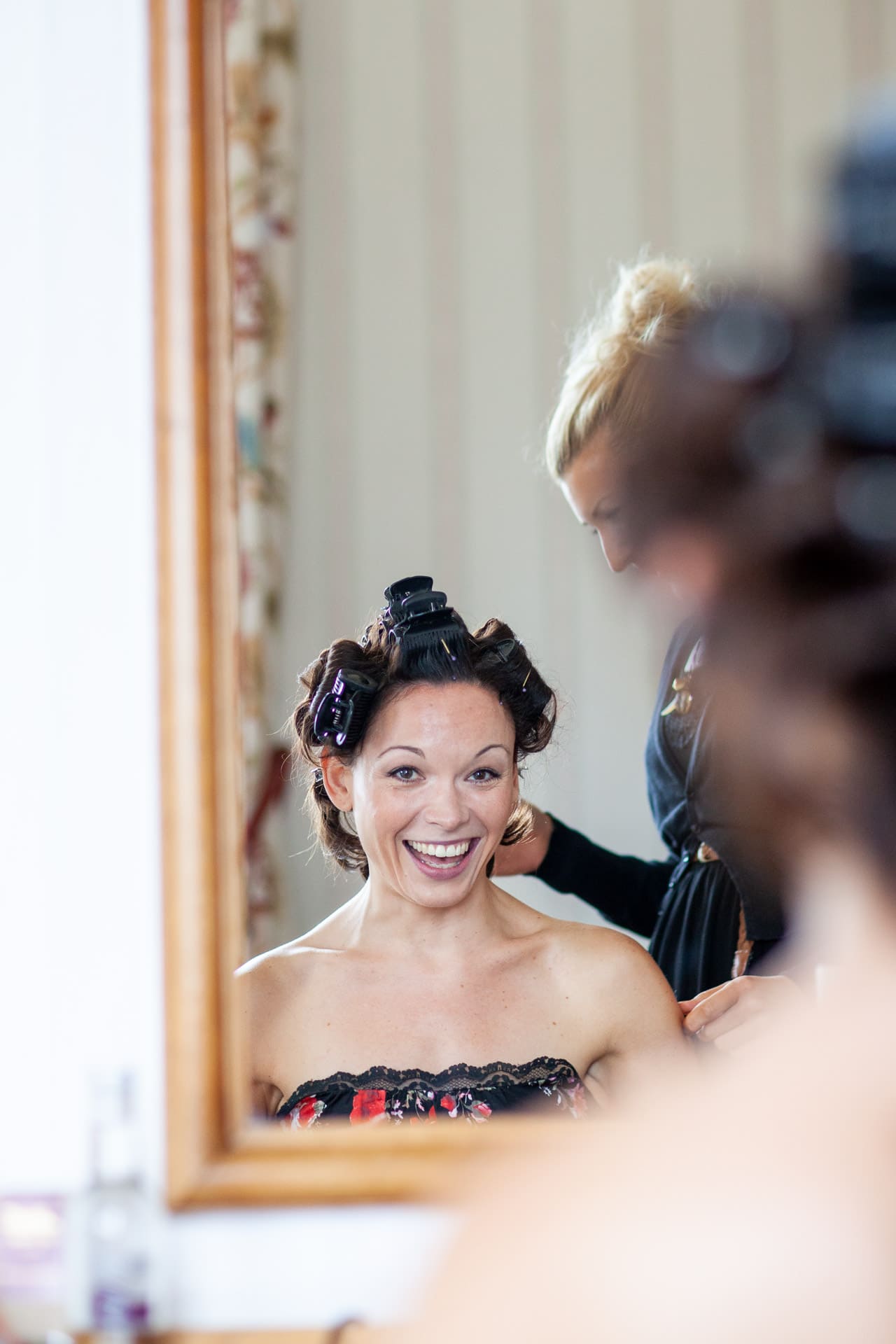 happy bride in the mirror