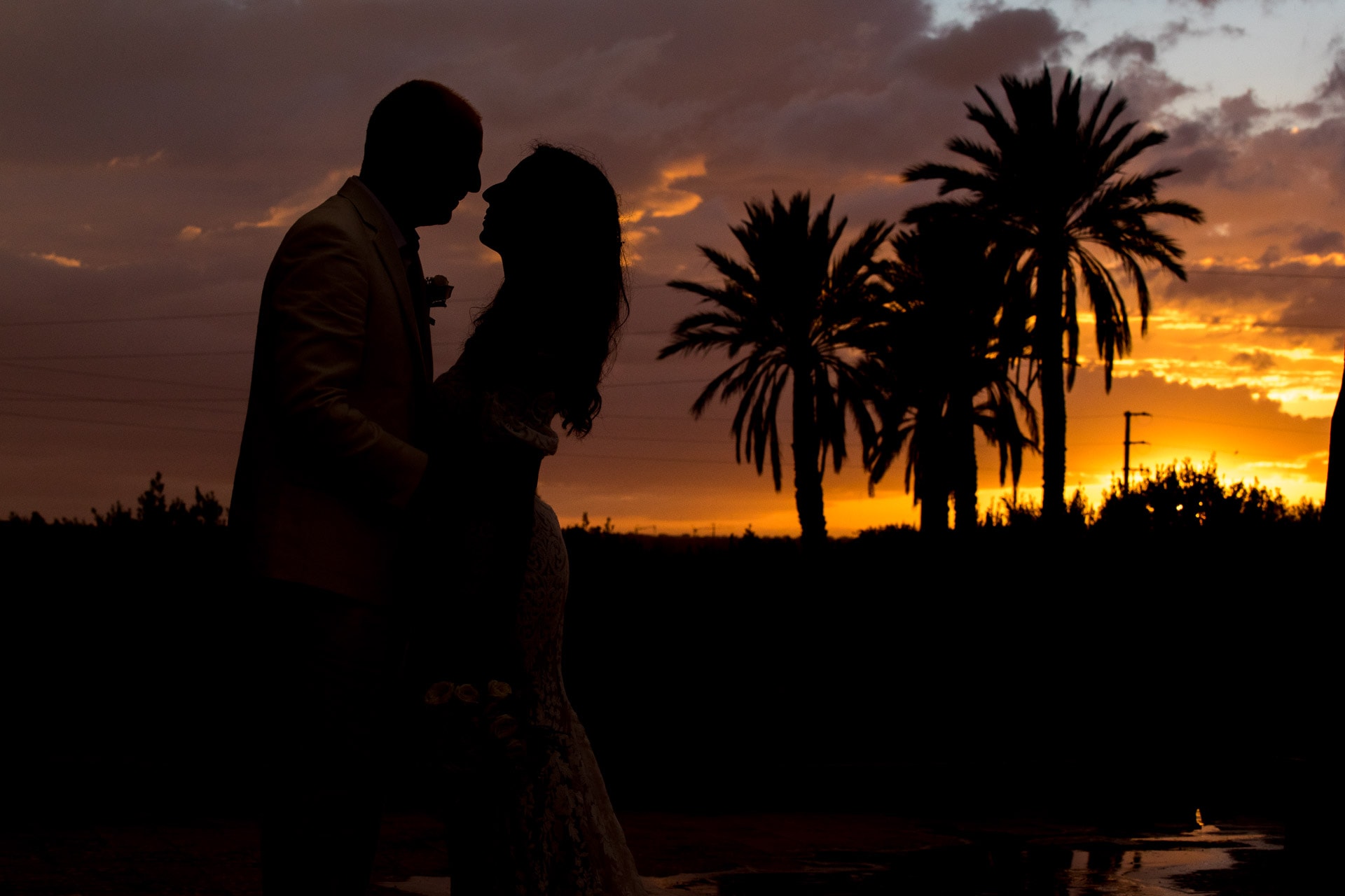 sunset silhouette moroccan wedding