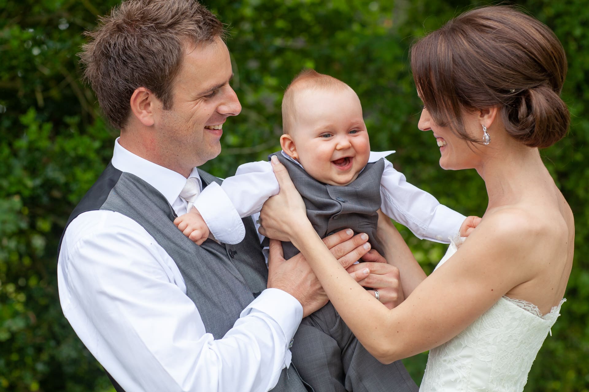 wedding couple and their child