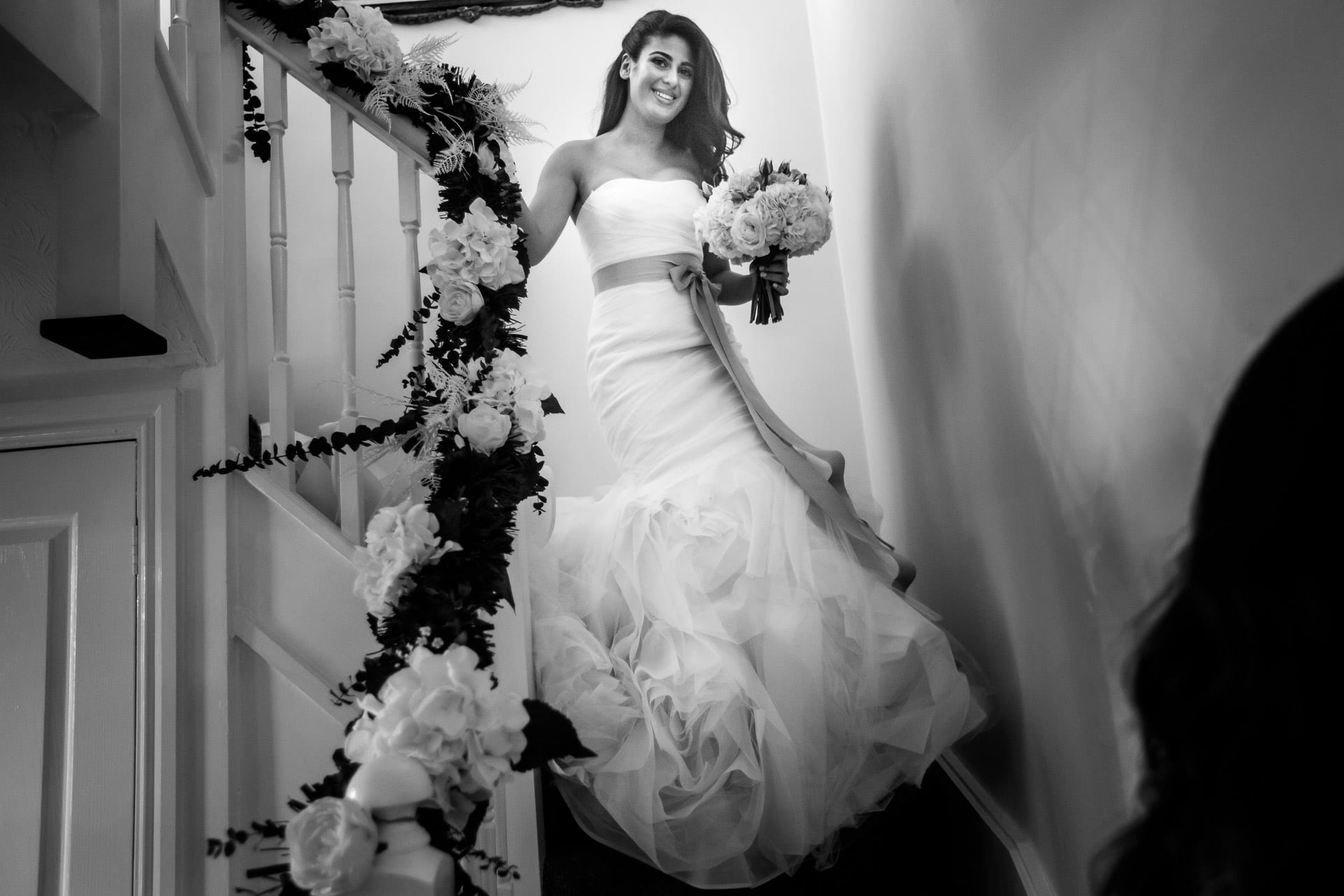 greek bride coming downstairs