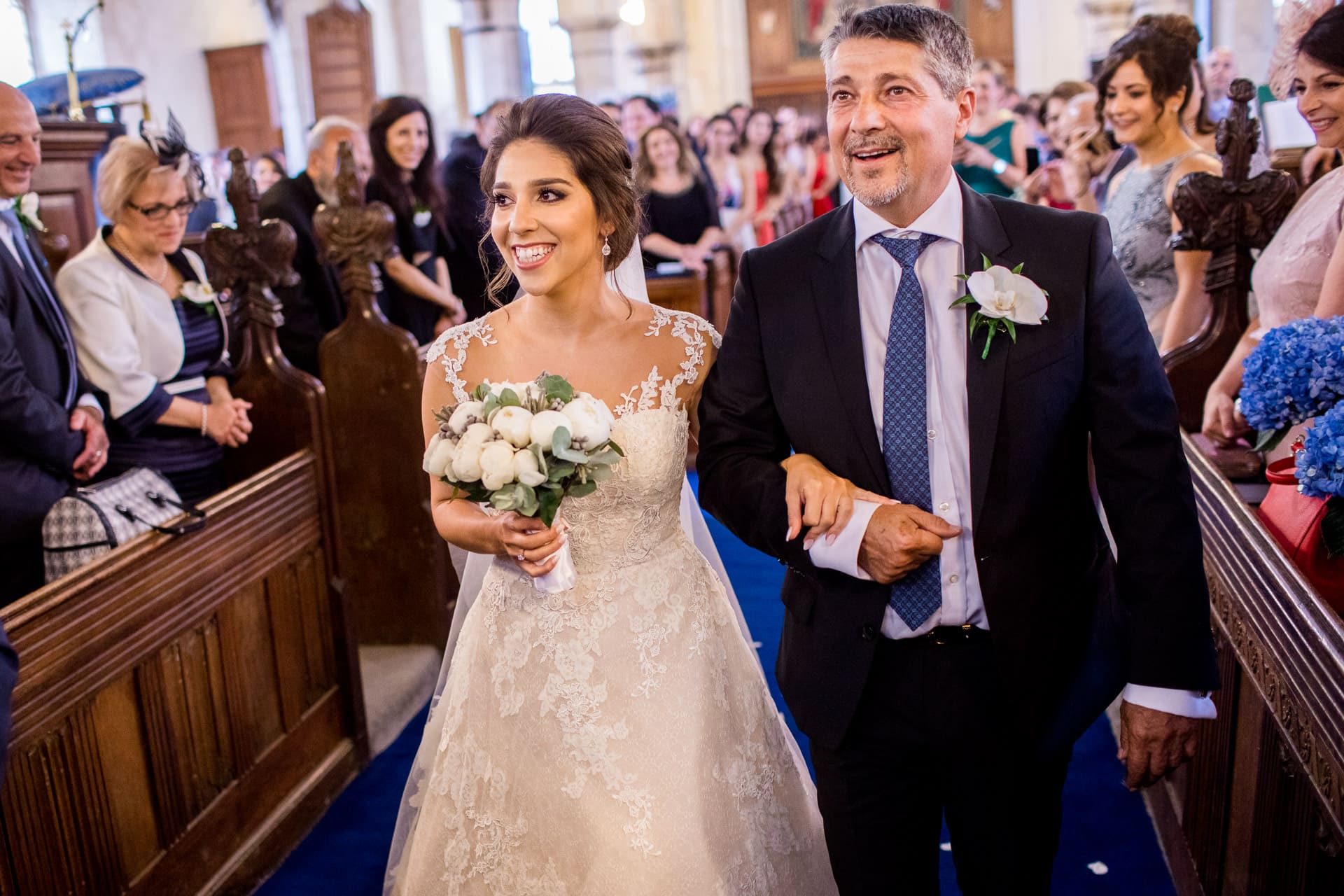 bride and dad walking up the aisle