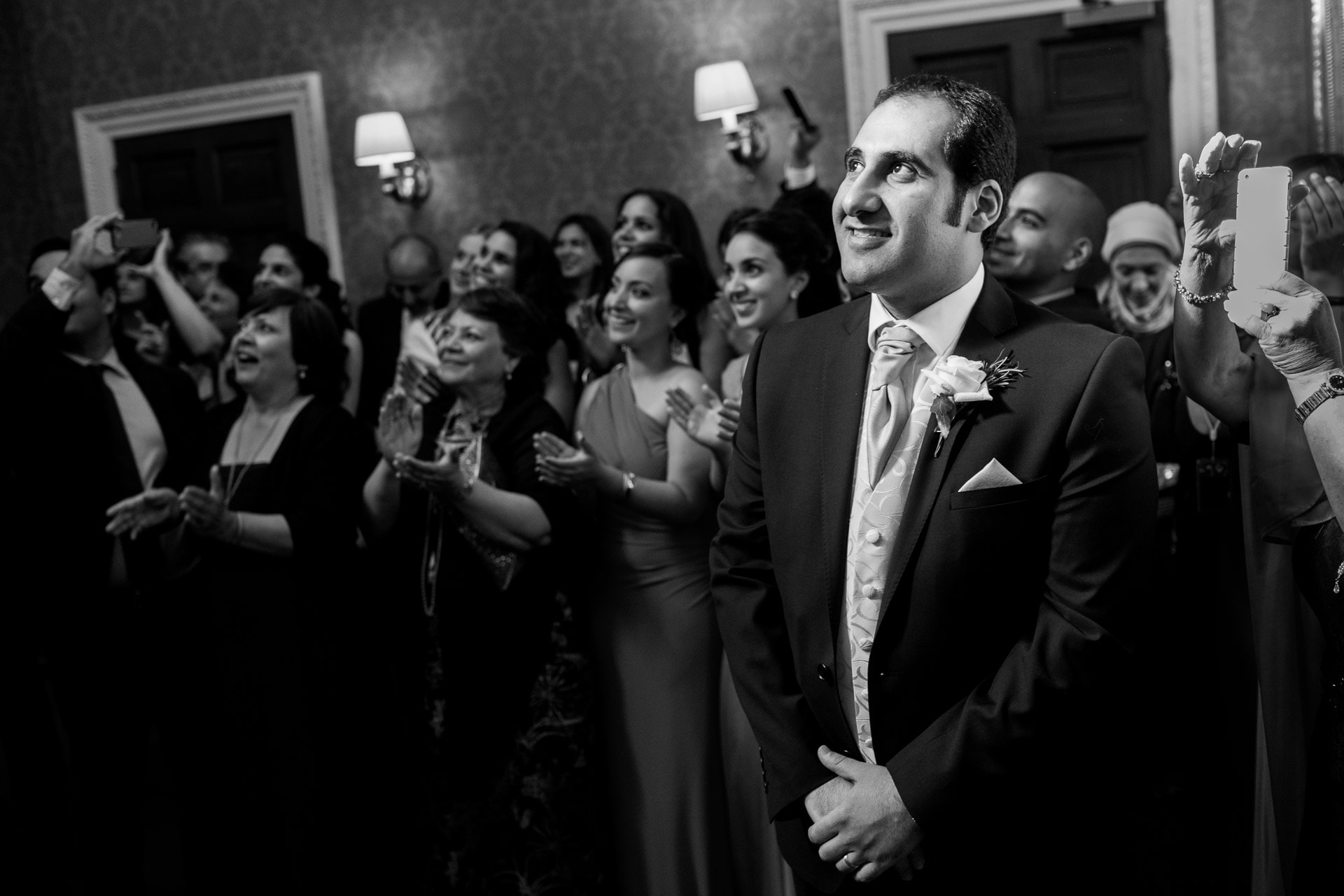 excited groom sees bride for the first time