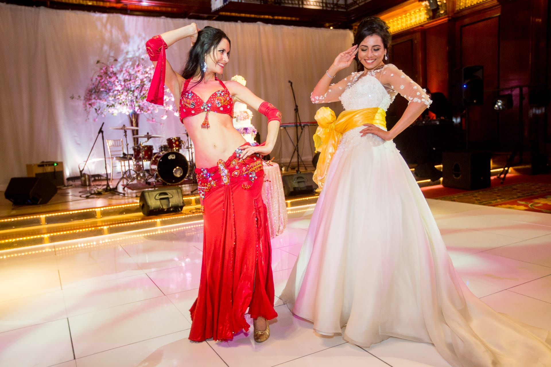 bride and belly dancer