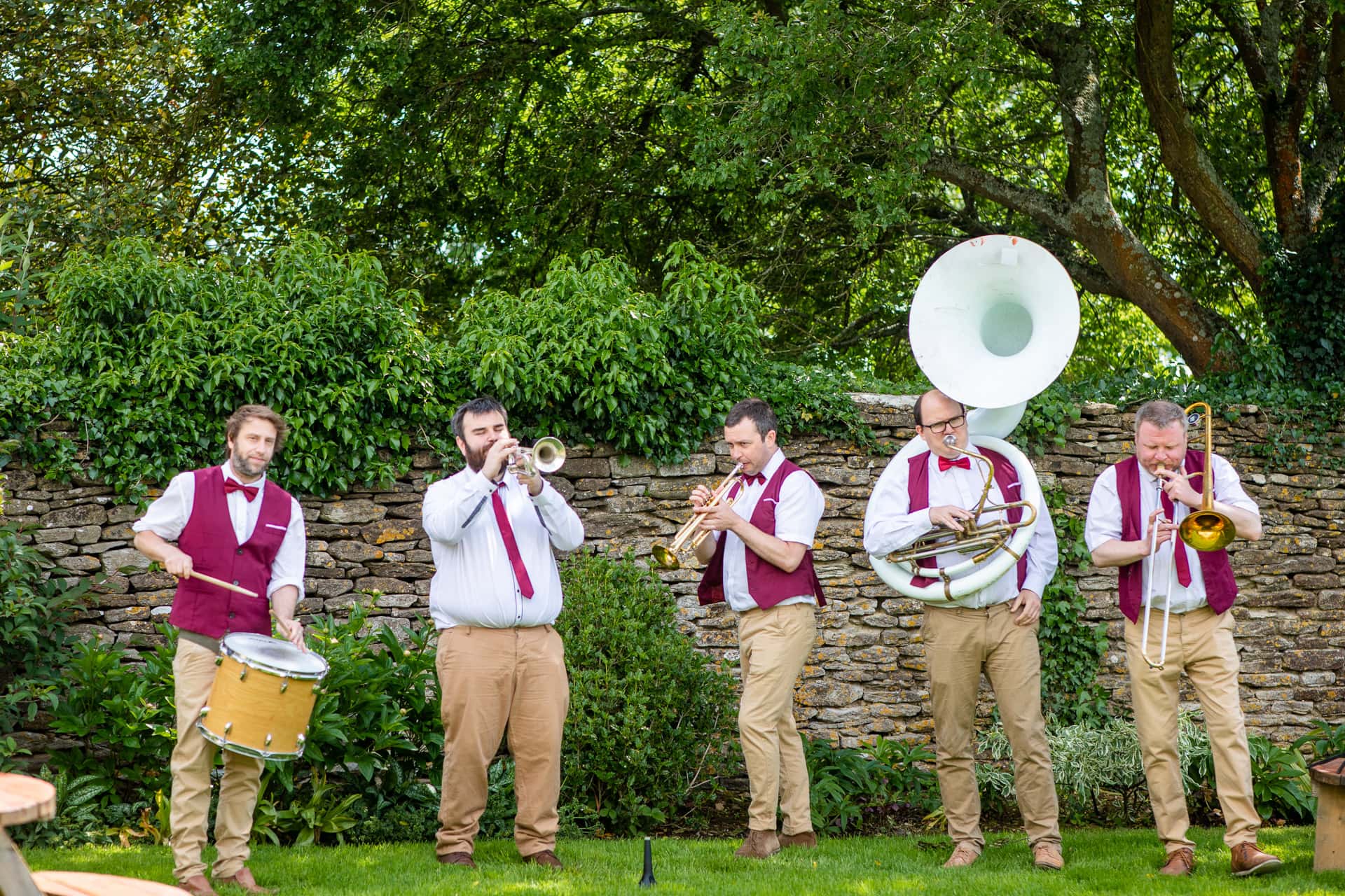 retro brass band playing at a wedding