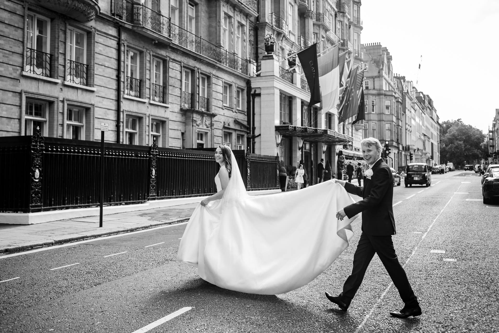 bride and groom walking in Brook Street