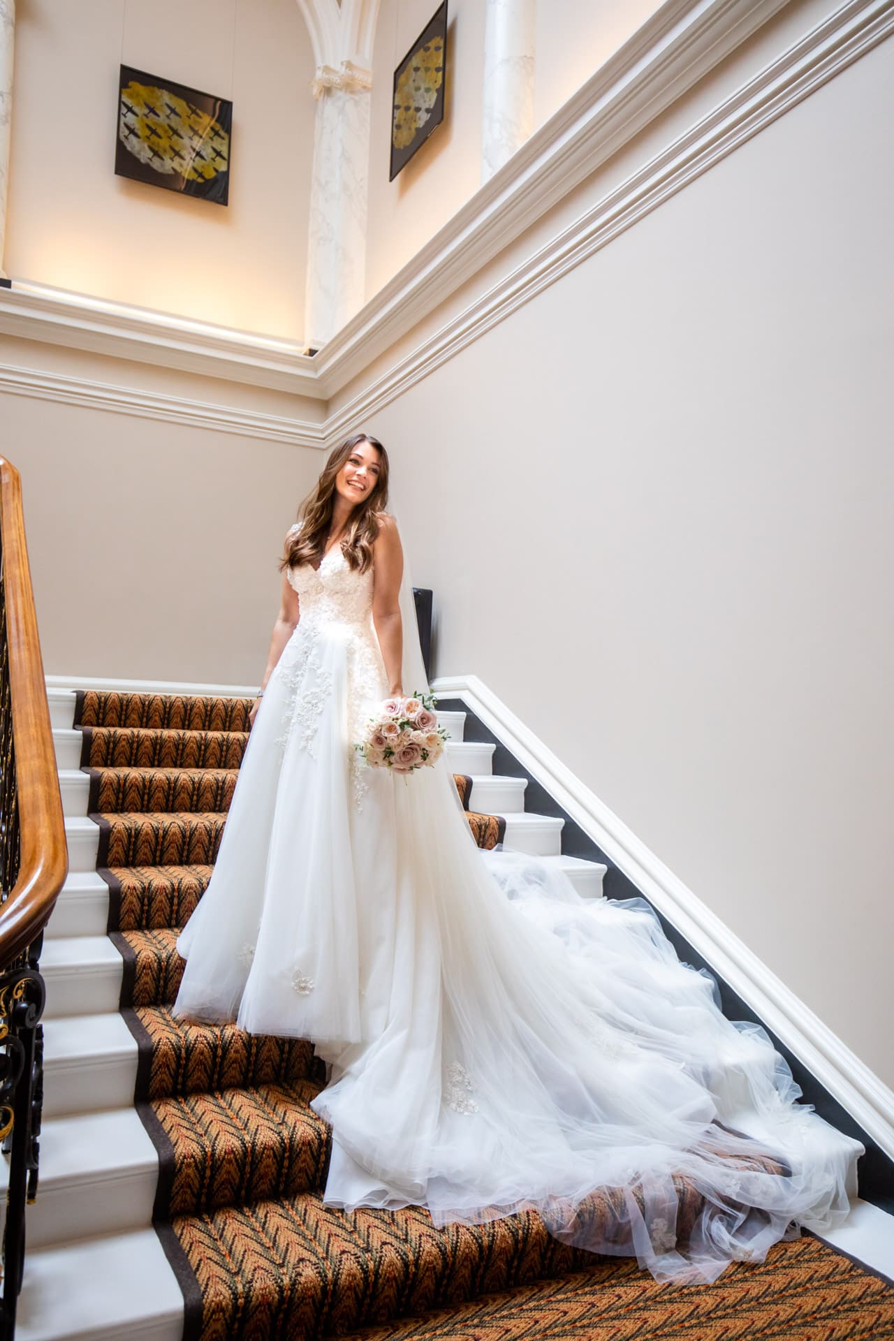 epic wedding dress on staircase