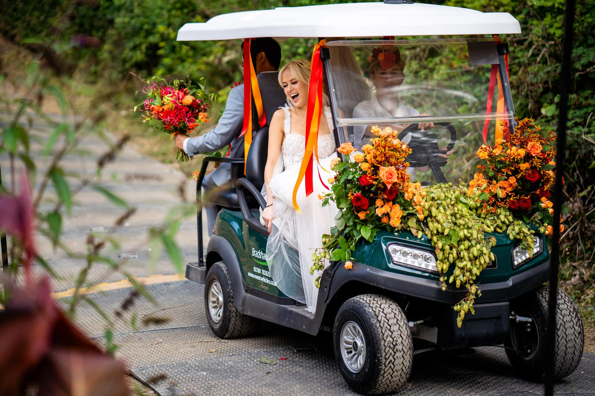 brie arriving on golf cart