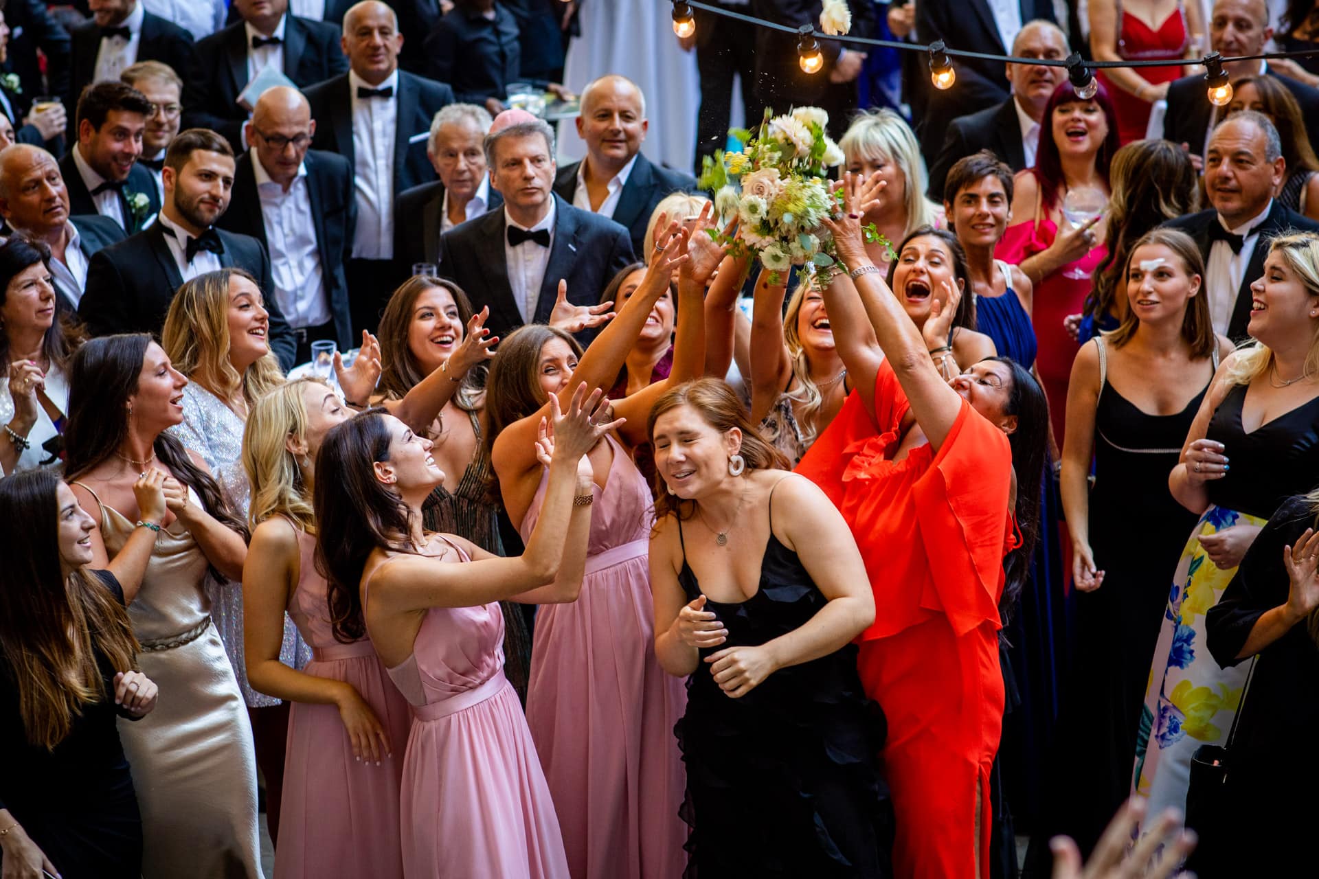 girls catching the bouquet