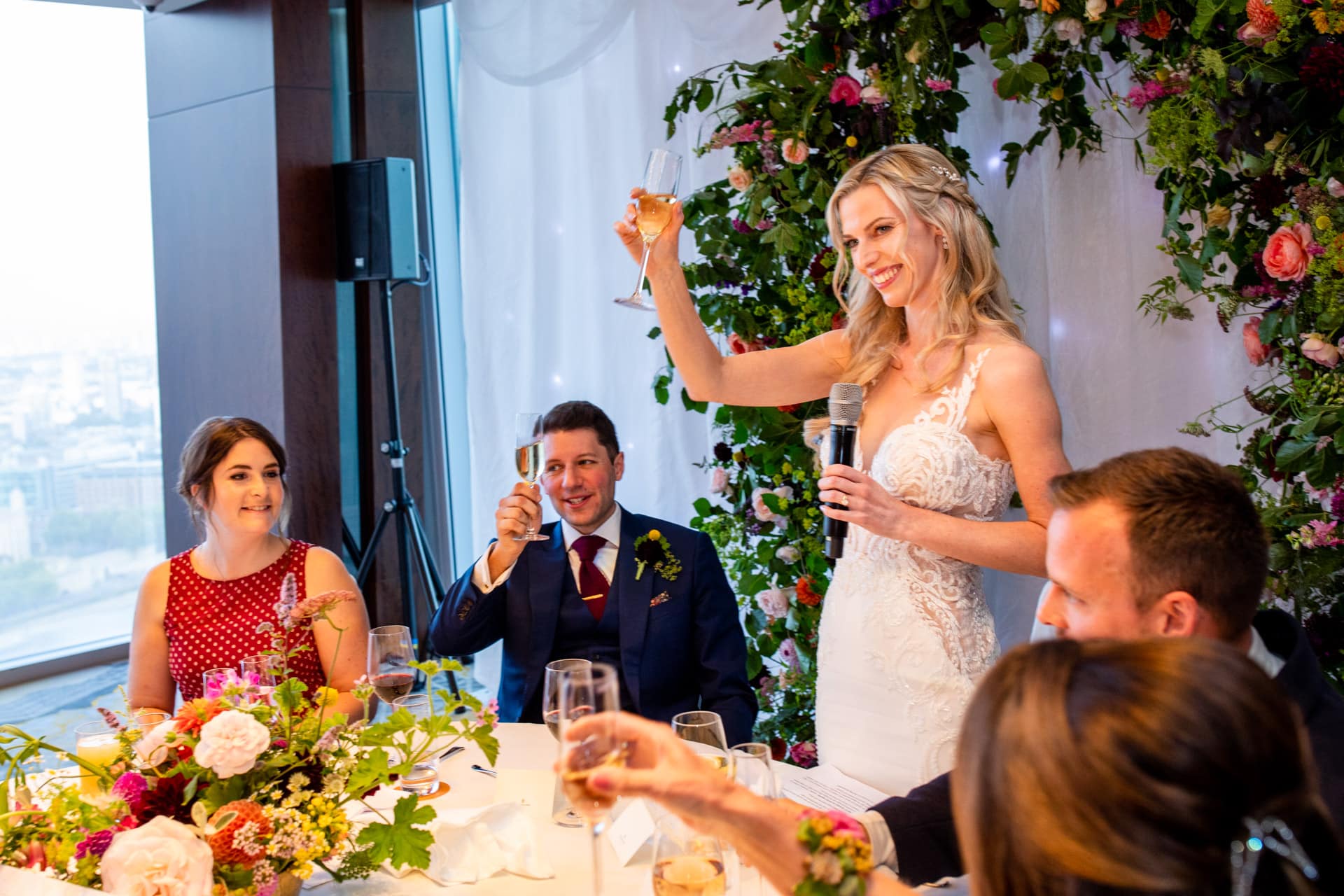 bride toasting her best friends