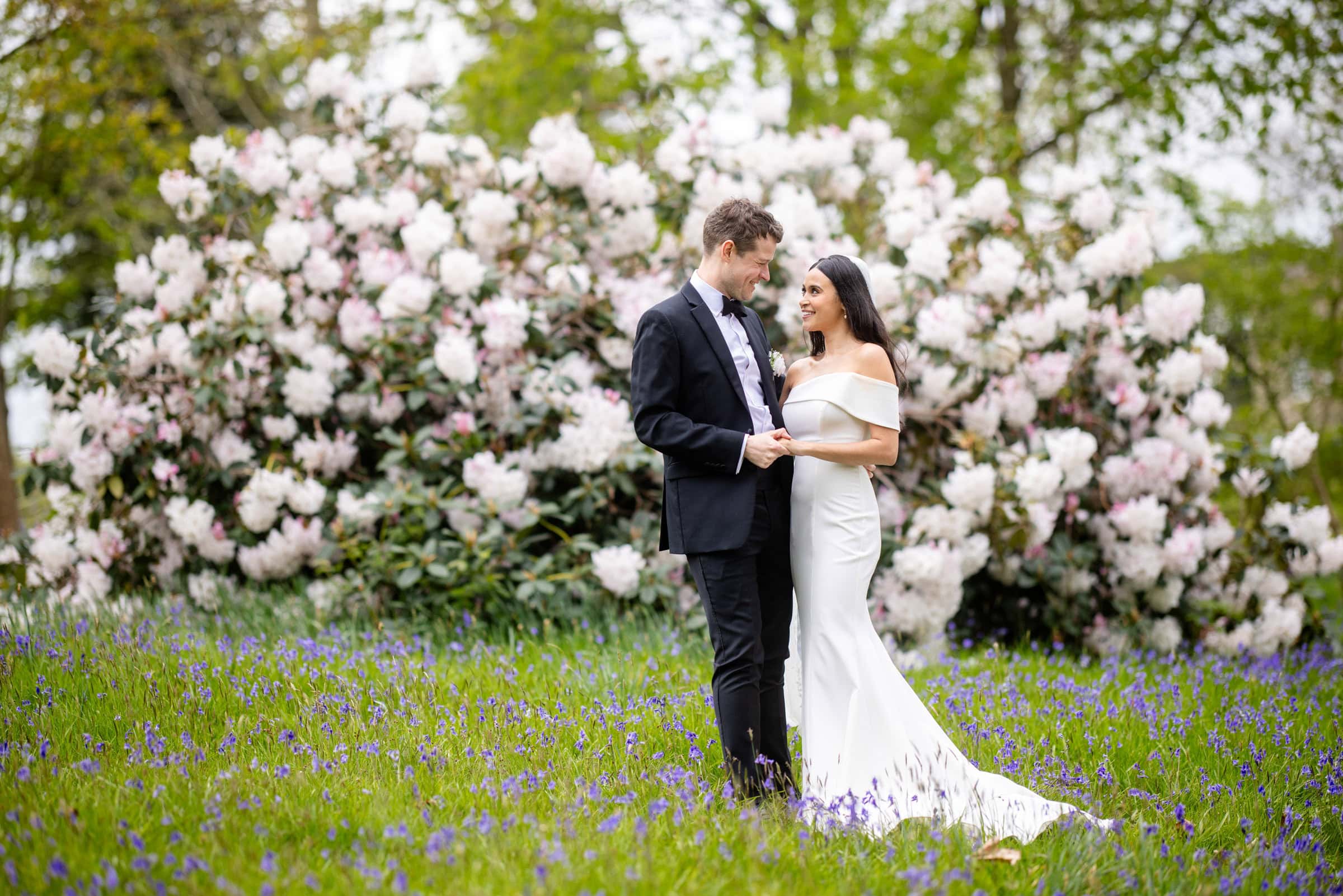 stunning wedding couple in the bluebells at Hedsor